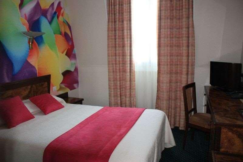 Hotel Terminus Montparnasse Paris Oda fotoğraf